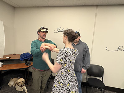 coach demonstrating technique
